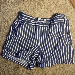 faded glory, blue and white shorts. size large